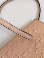 Coach Dusty Rose Pink Embossed Logo Anna Foldover Crossbody Bag