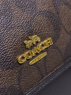 Coach Mini Sierra Handbag in Signature Brown Canvas with Strap