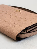 Coach Dusty Rose Pink Embossed Logo Anna Foldover Crossbody Bag