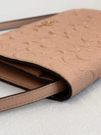 Coach Dusty Rose Pink Embossed Logo Anna Foldover Crossbody Bag
