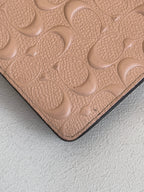 Coach Dusty Rose Pink Embossed Logo Anna Foldover Crossbody Bag