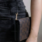 Coach Anna Foldover Crossbody Clutch In Signature Canvas