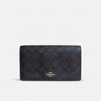 Coach Anna Foldover Crossbody Clutch In Signature Canvas