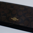 Coach Anna Foldover Crossbody Clutch In Signature Canvas