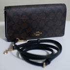 Coach Anna Foldover Crossbody Clutch In Signature Canvas