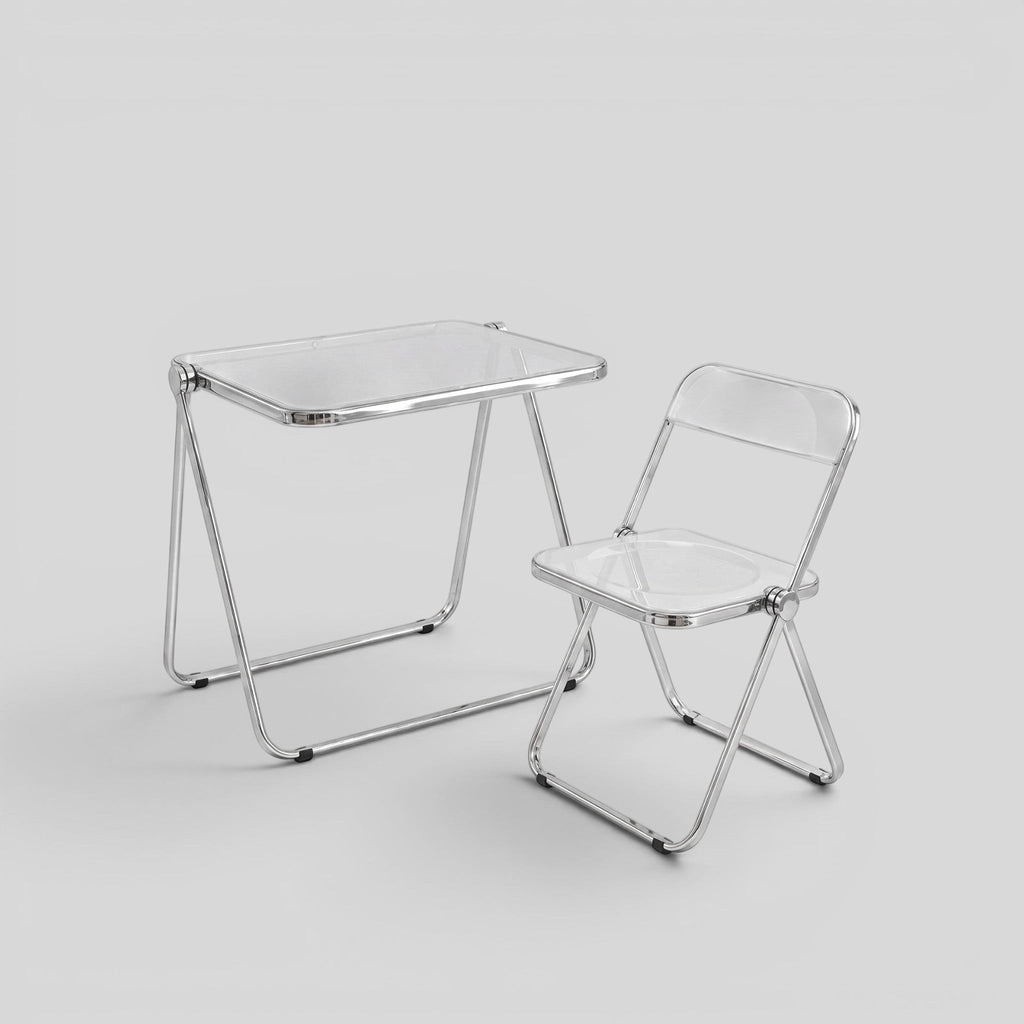 ESTYNE Studio folding chair and table set with transparent acrylic seats and polished chrome frames.